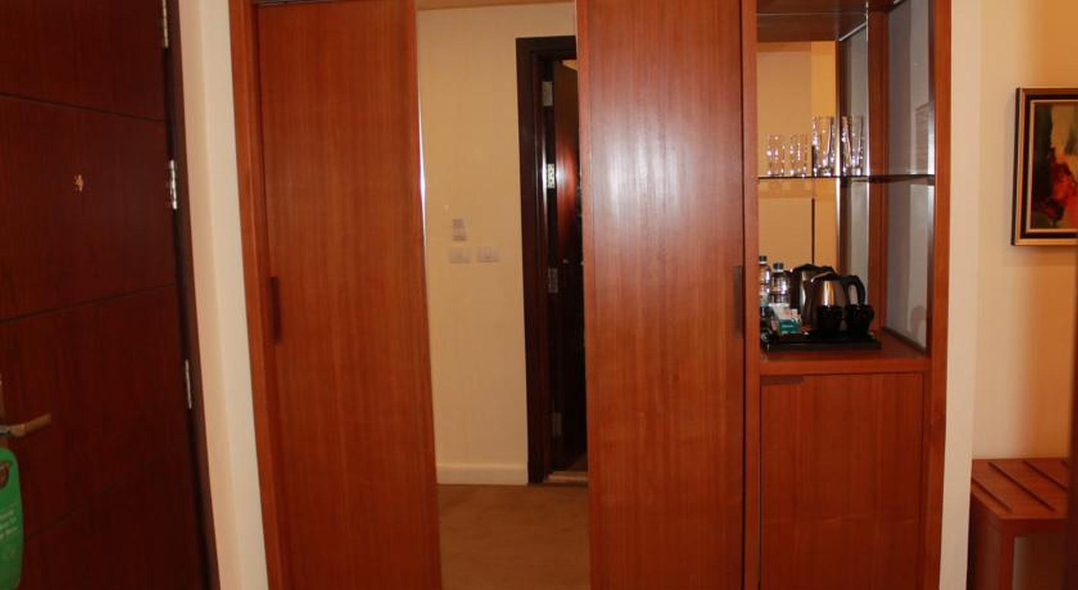 Tolip Family Park Hotel Il Il Cairo Esterno foto A sliding door