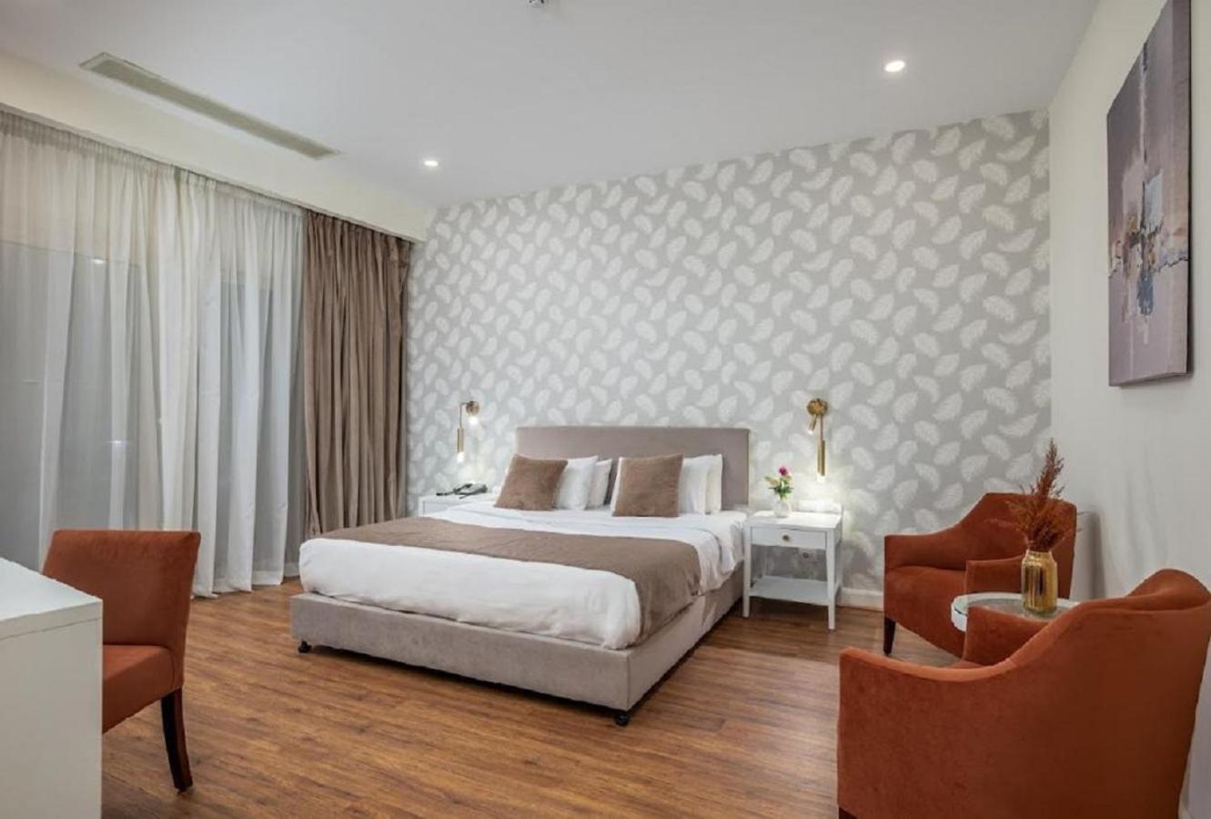Tolip Family Park Hotel Il Il Cairo Esterno foto A bedroom at the hotel