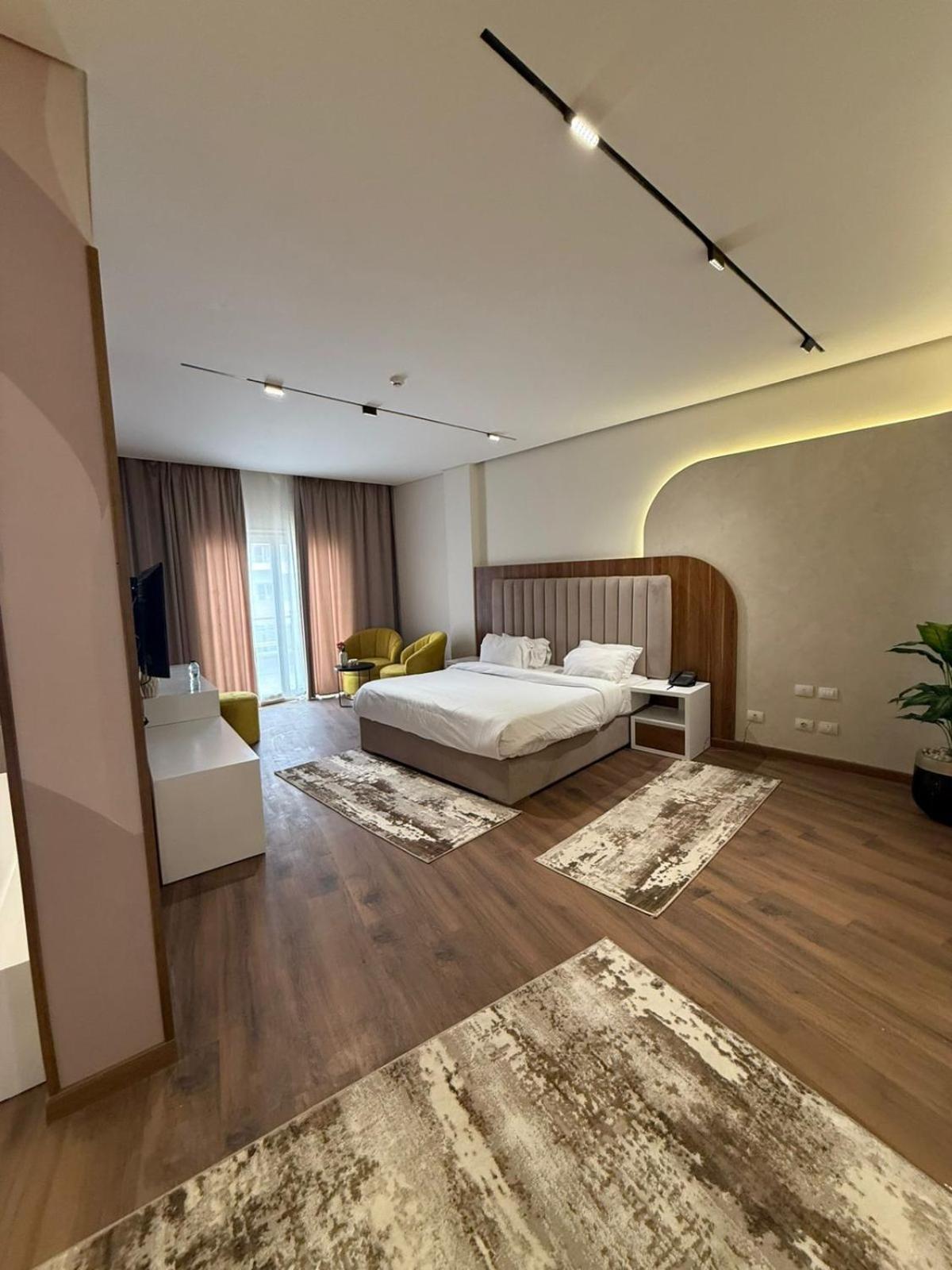 Tolip Family Park Hotel Il Il Cairo Esterno foto A bedroom at the hotel