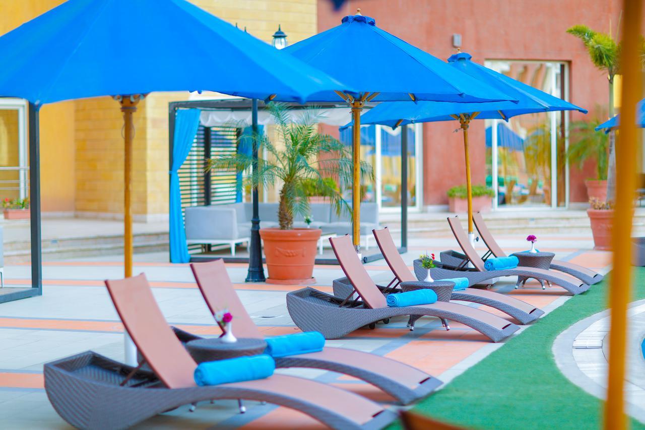 Tolip Family Park Hotel Il Il Cairo Esterno foto The pool at the hotel