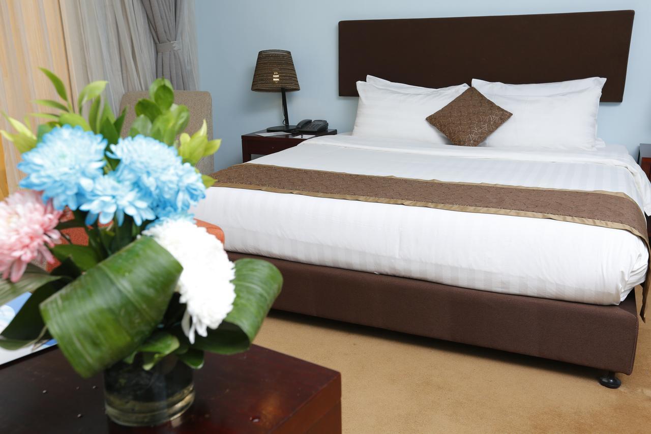 Tolip Family Park Hotel Il Il Cairo Esterno foto A bedroom at the hotel