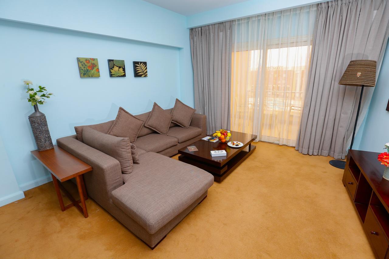 Tolip Family Park Hotel Il Il Cairo Esterno foto A living room