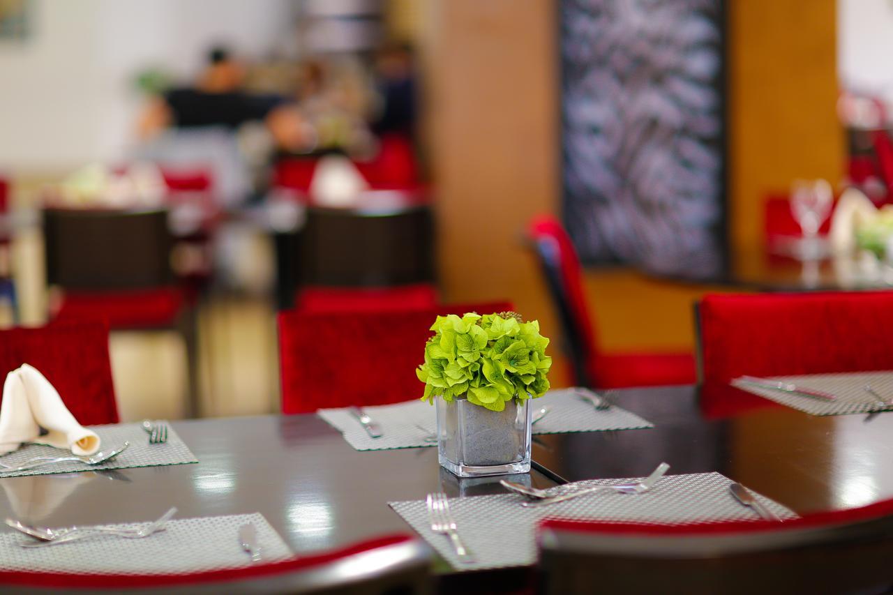 Tolip Family Park Hotel Il Il Cairo Esterno foto Restaurant interior